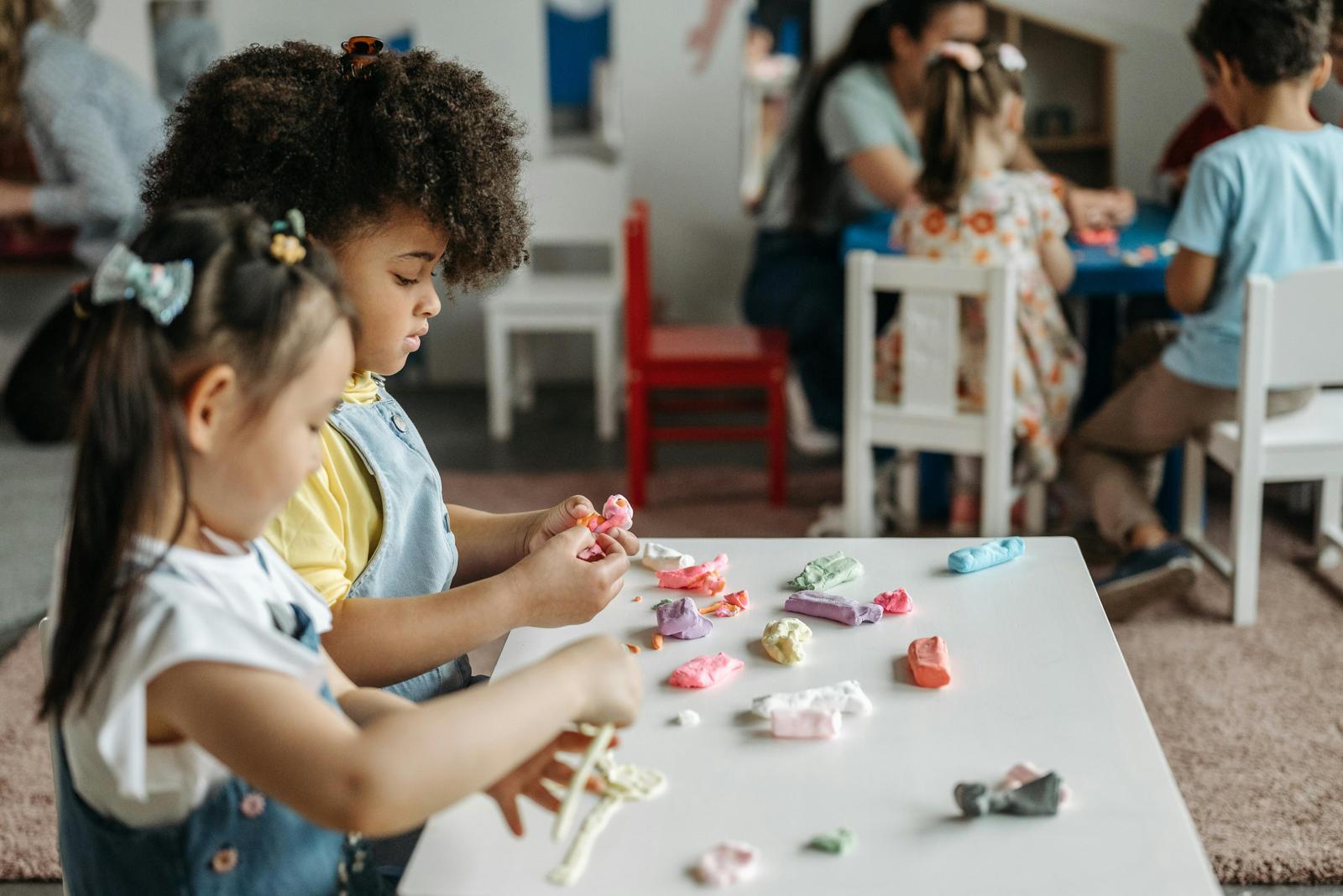 Children engaged in play-based learning during a therapy session